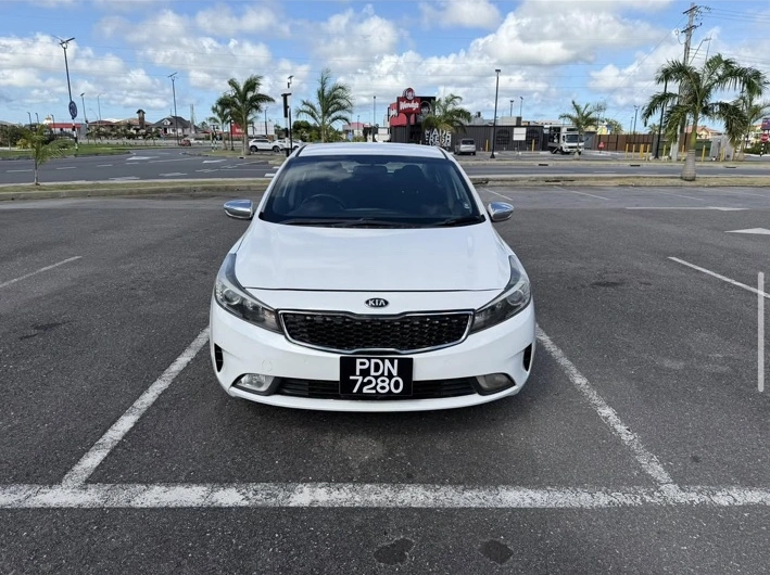 White Kia Cerato at Classy Motors